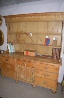 Lot 696 - A Victorian pine dresser, the top above an...
