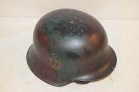 Lot 425 - A WWII German SS helmet.