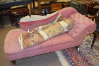 Lot 670 - A Victorian chaise longue, upholstered in pink...