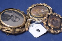 Lot 9 - Two Victorian yellow metal mourning brooches,...