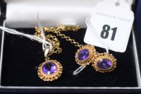 Lot 81 - A 9ct. yellow gold mounted amethyst pendant on...