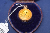 Lot 120 - A 14ct. carat gold cased open faced fob watch,...