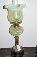 Lot 430 - A Victorian brass oil lamp with vaseline glass...