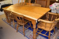 Lot 522 - A 20th Century pine kitchen table, 183cms long;...