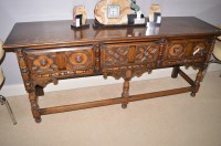 Lot 708 - A 20th Century stained and carved oak...