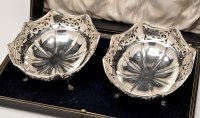 Lot 166 - A pair of George V pierced silver baskets, by...