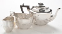 Lot 193 - A George V three piece silver tea service, by...