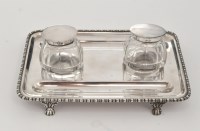 Lot 204 - A George V silver inkwell and pen tray, by S.W....