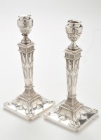 Lot 206 - A pair of George V silver candlesticks, by...