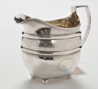Lot 211 - A George III silver cream jug, by Duncan...