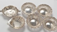 Lot 249 - A set of four Victorian silver bonbon dishes,...