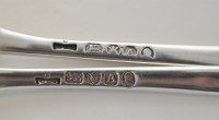 Lot 265 - A pair of George III silver marrow scoops, by...