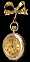 Lot 348 - A 9ct. gold lady's fob watch, with gilt roman...