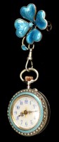 Lot 349 - A silver cased enamel and seed pearl fob watch,...