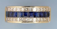 Lot 372 - A sapphire and diamond dress ring, set with a...