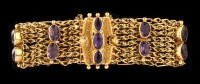 Lot 378 - A Victorian amethyst and yellow metal bracelet,...