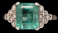 Lot 379 - An Art Deco emerald and diamond ring, the...