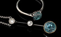 Lot 399 - An Edwardian zircon and diamond drop pendant,...