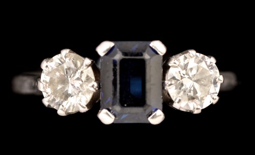 Lot 401 - A sapphire and diamond ring, the rectangular...