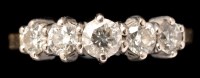 Lot 408 - A five stone diamond ring, the slightly...