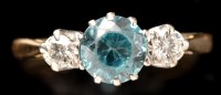 Lot 414 - A zircon and diamond ring, the central...