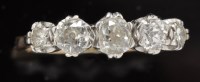 Lot 416 - A five stone diamond ring, the old cut...