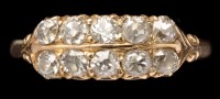 Lot 443 - An Edwardian ten stone diamond ring, the old...