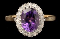 Lot 444 - An amethyst and diamond cluster ring, the oval...