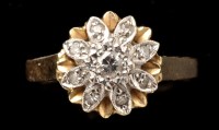 Lot 448 - A diamond cluster ring, the central brilliant...