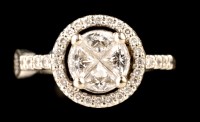 Lot 452 - A diamond cluster ring, four triangular facet...