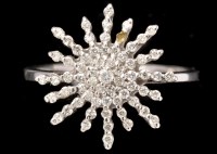 Lot 453 - A diamond dress ring, set with graduated...