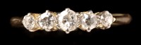 Lot 458 - A five stone diamond ring, the five graduated...