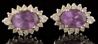 Lot 499 - A pair of amethyst and diamond cluster...