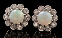 Lot 502 - A pair of opal and diamond cluster earrings,...
