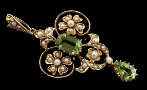 Lot 506 - An Edwardian peridot and seed pearl pendant,...