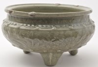 Lot 550 - Large Chinese celadon tripod censer, squat...