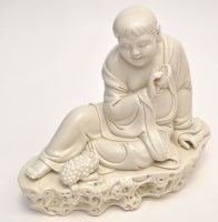 Lot 596 - Chinese 'Dehua' figure of Budha Maitreya,...