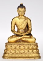 Lot 623 - Chinese gilt bronze figure of Buddha...