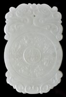 Lot 633 - Chinese celadon jade plaque, with disc form...