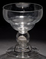 Lot 660 - Large coin goblet, ogee shaped bowl above...