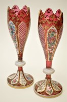 Lot 663 - Pair of Bohemian ruby glass enamel flower vase,...