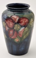 Lot 678 - Moorcroft 'Pansy' vase, tapering cylindrical...