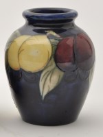 Lot 688 - Moorcroft 'Wisteria' jar on mottled blue...