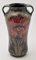 Lot 691 - Moorcroft 'Revived Cornflower' two-handled...