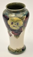 Lot 695 - Moorcroft 'Pansy' pear shaped vase, the...