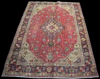 Lot 791 - A Tabriz style carpet, the central medallion...