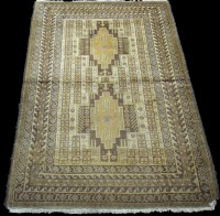 Lot 793 - A Turkoman rug, with two diamonds to medallion...