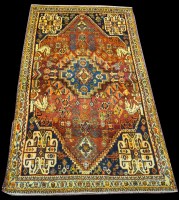 Lot 794 - A Qashqai rug, the central floral medallion...