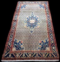 Lot 806 - A nomadic Persian rug, with central floral...