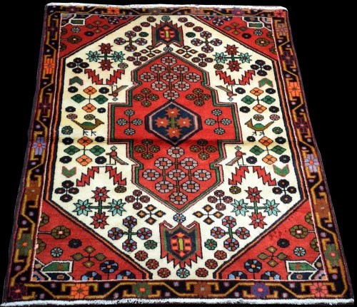Lot 813 - A nomadic Persian rug, with simple floral...